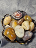 Banded agate tumbles
