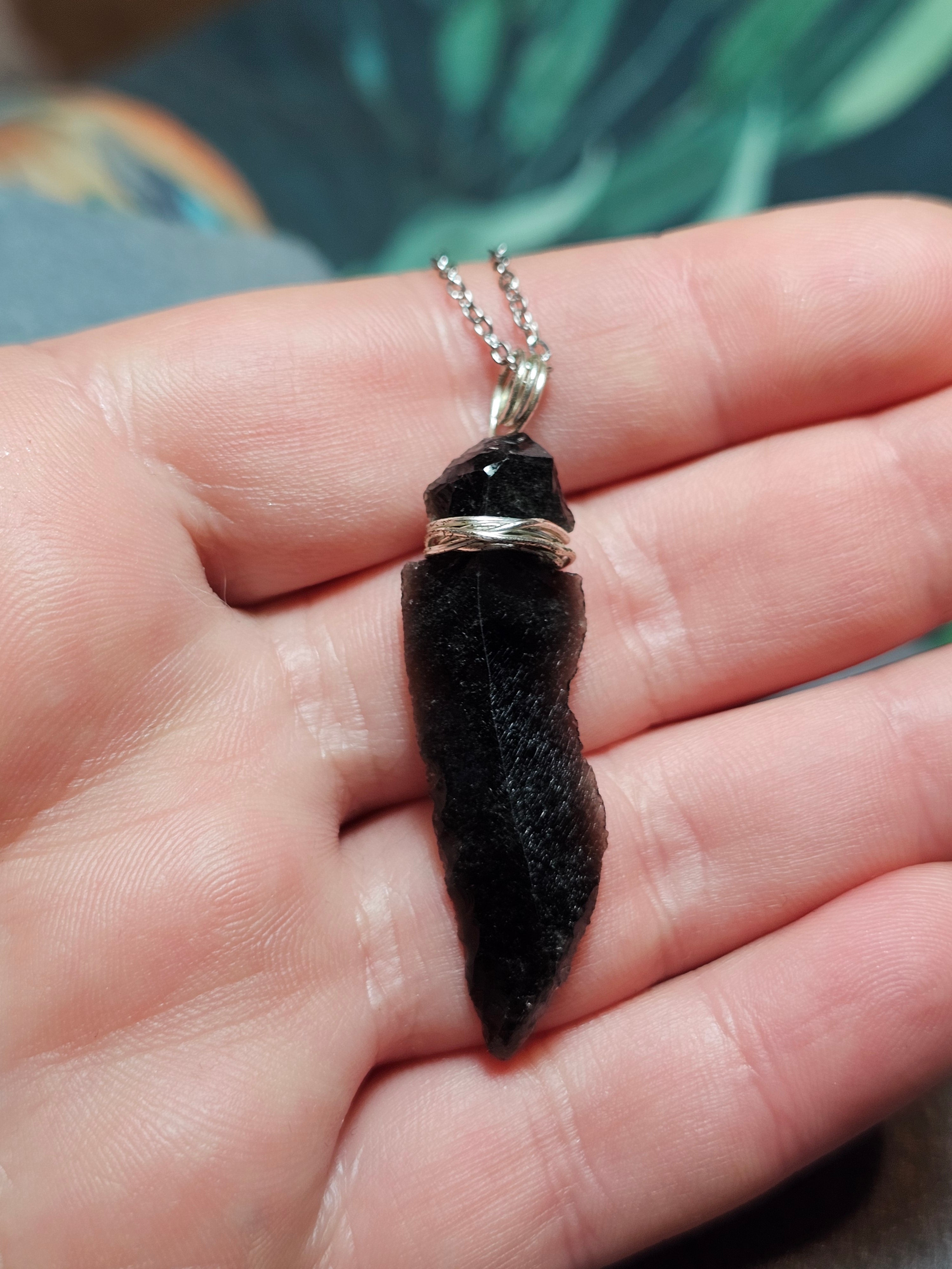 Obsidian arrowhead pendants