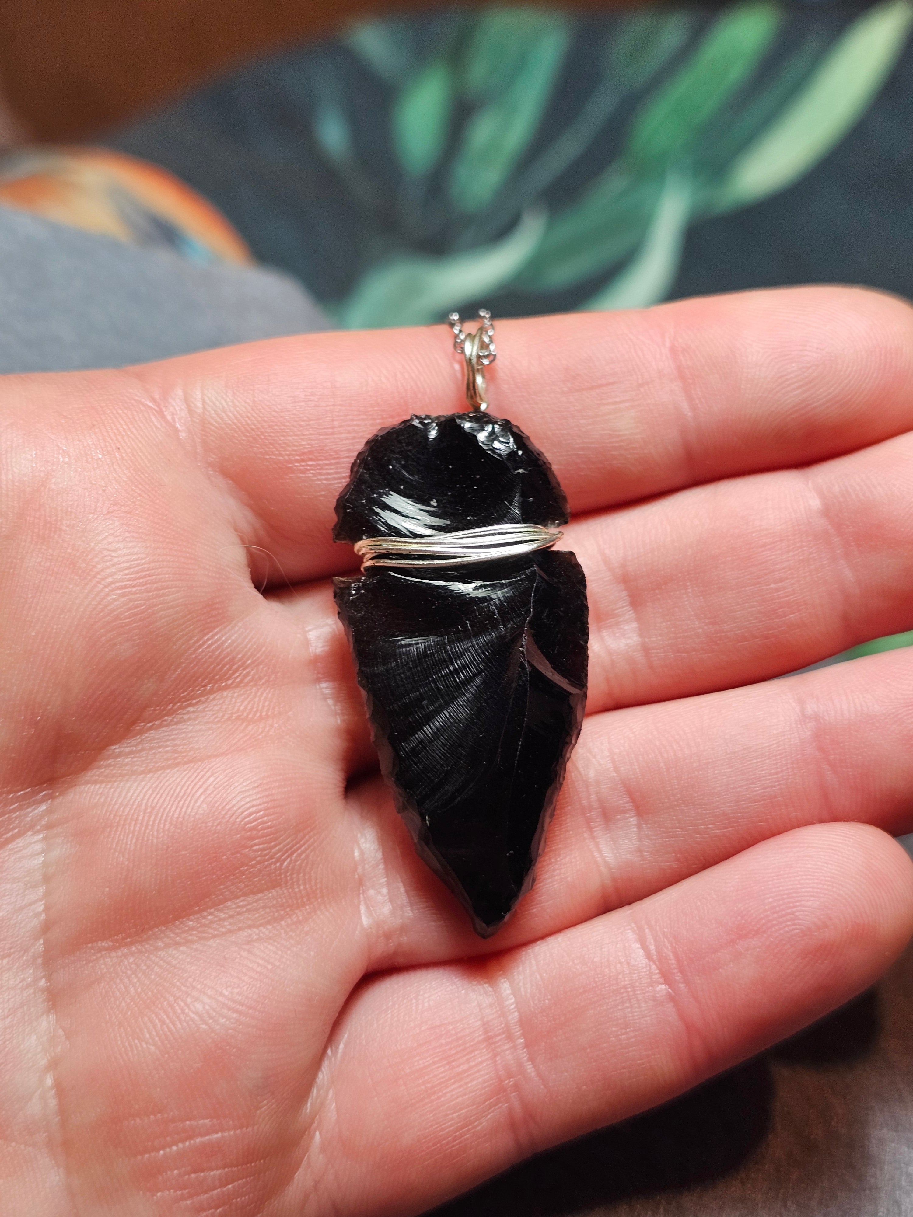 Obsidian arrowhead pendants