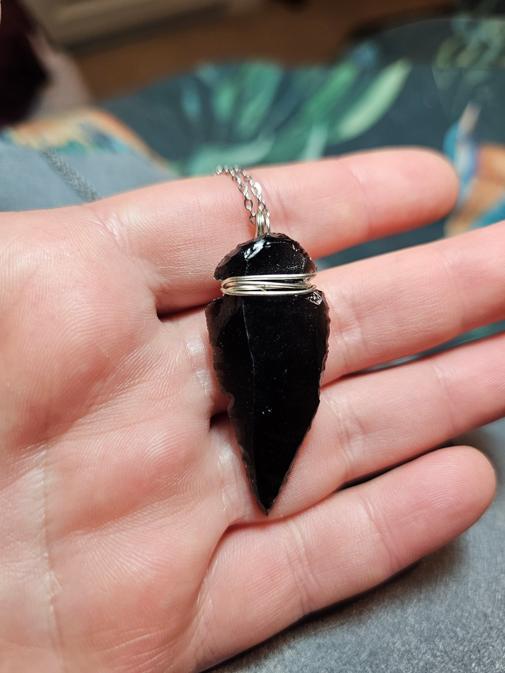 Obsidian arrowhead pendants
