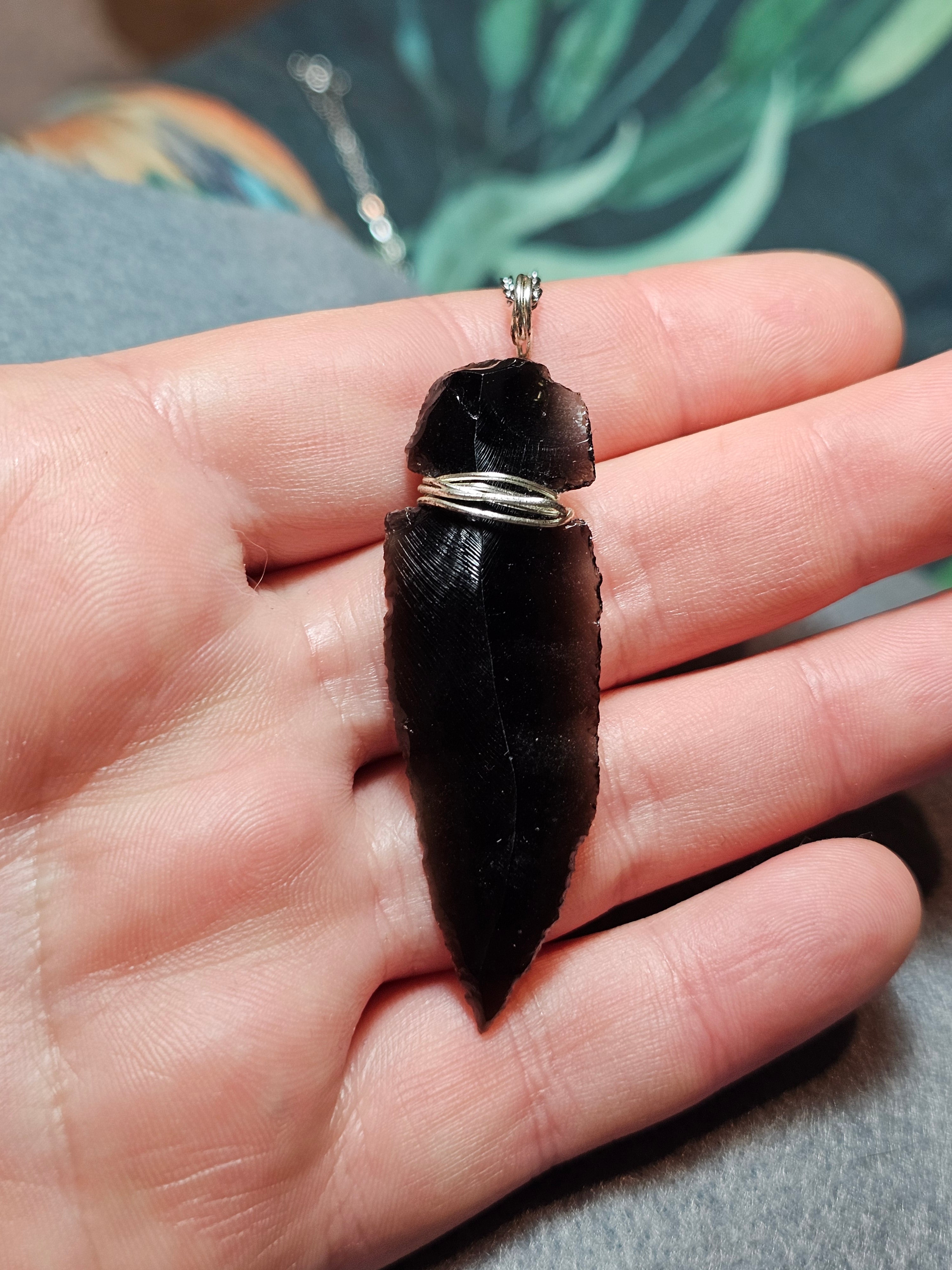 Obsidian arrowhead pendants