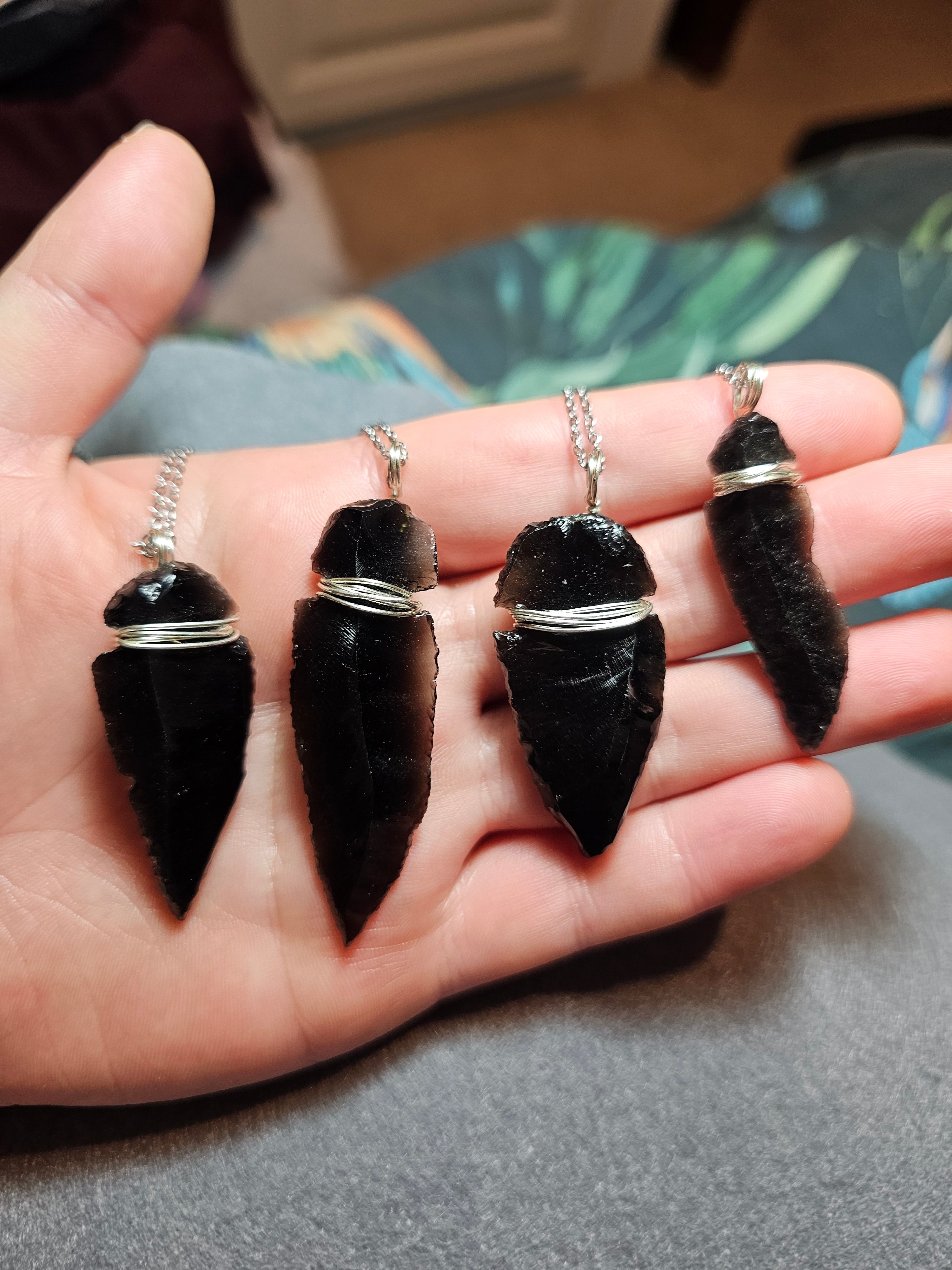Obsidian arrowhead pendants